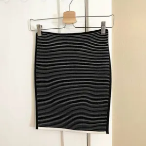La ligne black and white striped body con bandage skirt