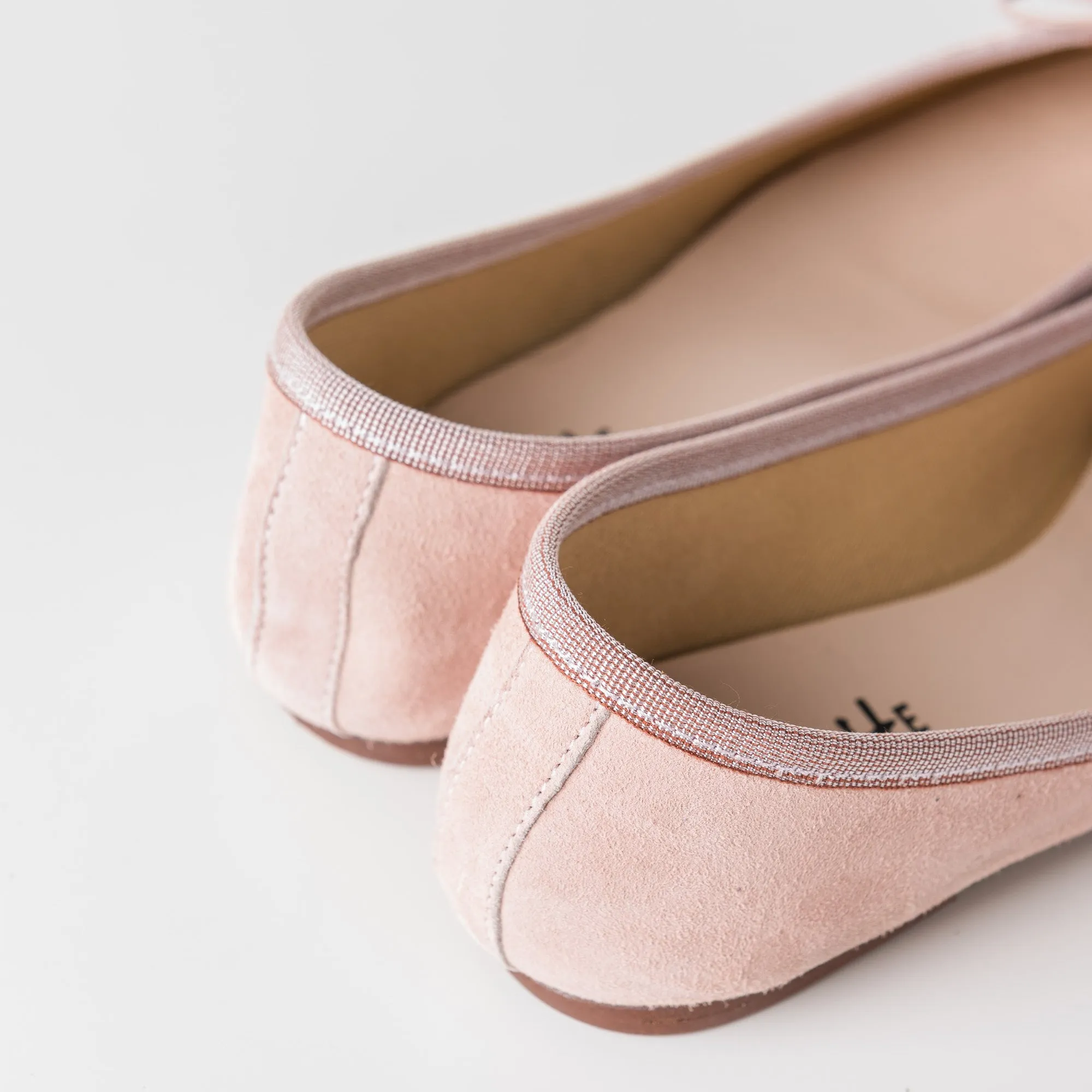 Pink suede ballet flats