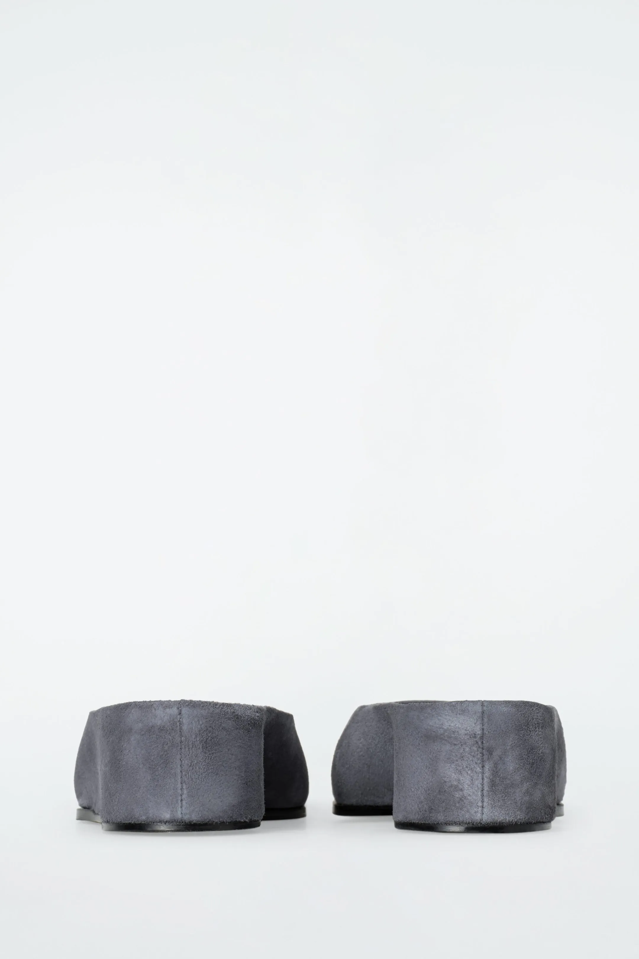 Pointed suede mules
